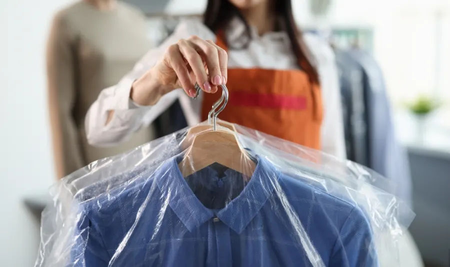 Dry cleaned shirt in protective cover at a Clapham dry cleaners