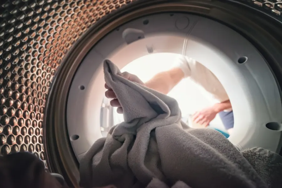 Clothes inside a washing machine drum